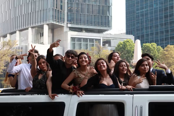 Happy customers enjoying luxury limousine service from transportmovehub.xyz during a memorable event.