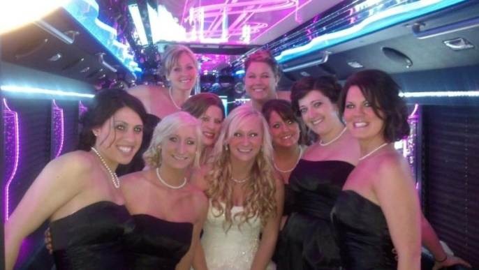 Happy customers enjoying luxury limousine service from transportmovehub.xyz in a memorable experience.